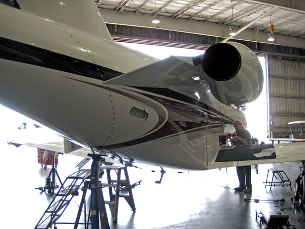Engineer working on jet plane